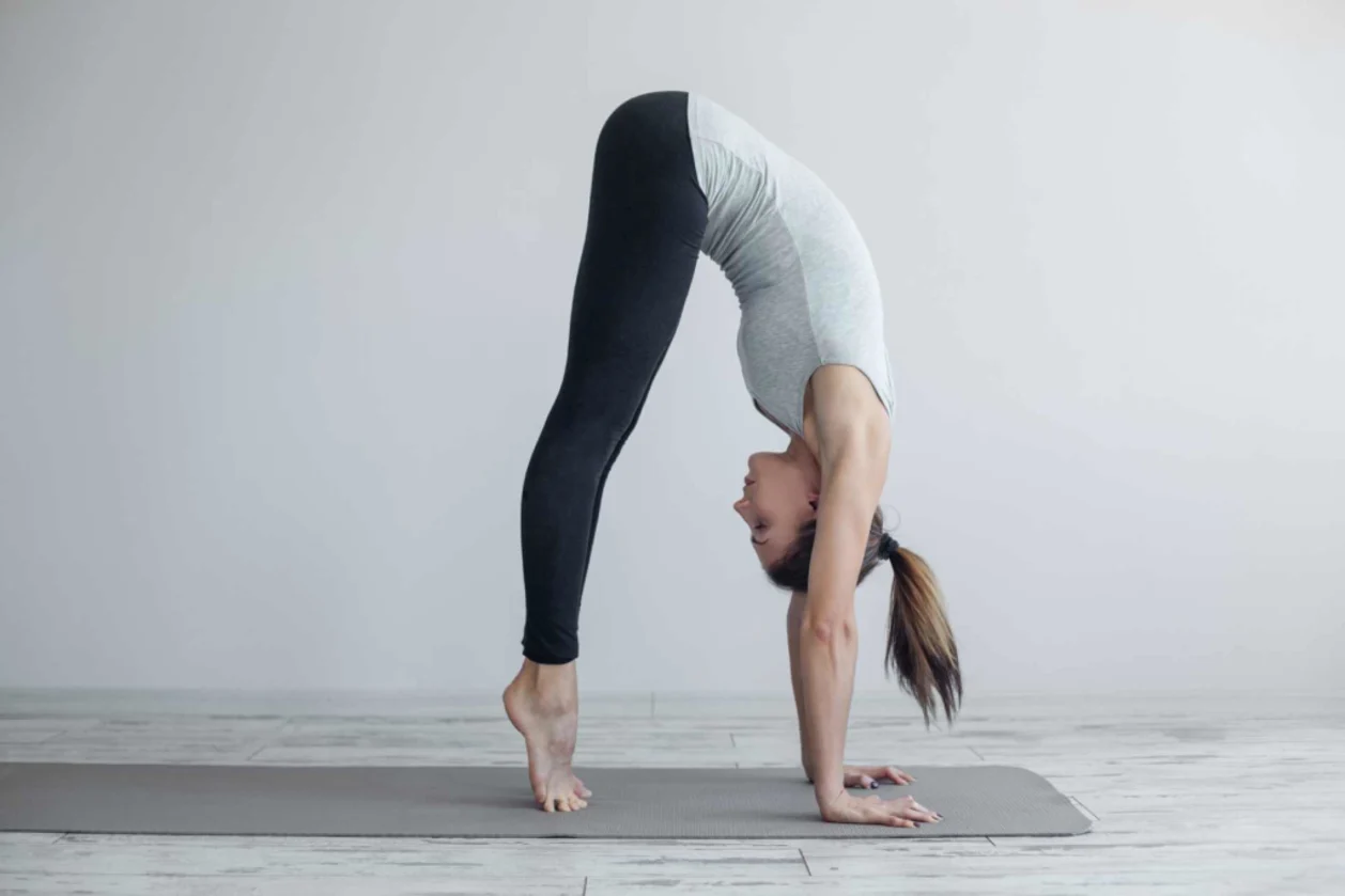female yogi in forward fold